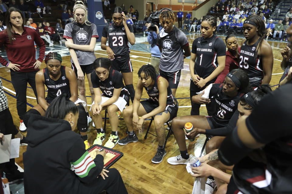 South Carolina head coach Dawn Staley draws up a play for her team during the first half of an NCAA college basketball game against South Dakota State, in Sioux Fall, S.D. on Thursday, Dec. 15, 2022. (AP Photo/Josh Jurgens)