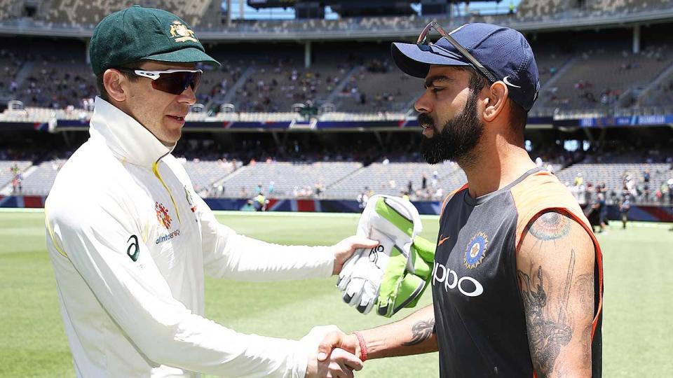 Tim Paine and Virat Kohli share the frostiest of handshakes. Pic: Getty