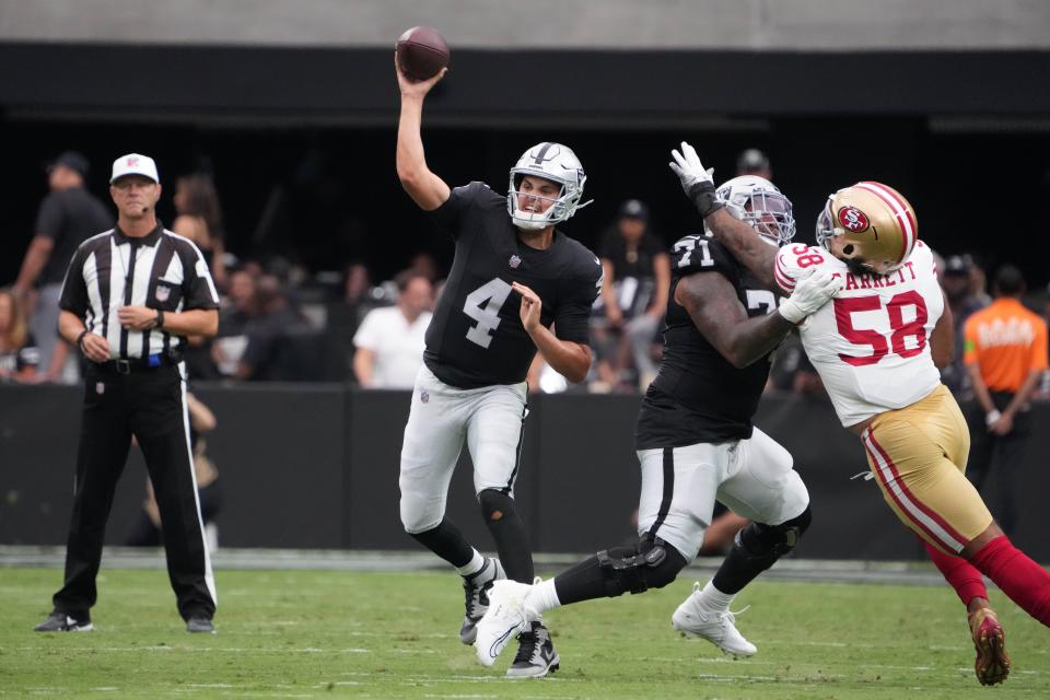 Las Vegas Raiders quarterback Aidan O'Connell throws the ball against the San Francisco 49ers during the first half of their preseason game at Allegiant Stadium.
