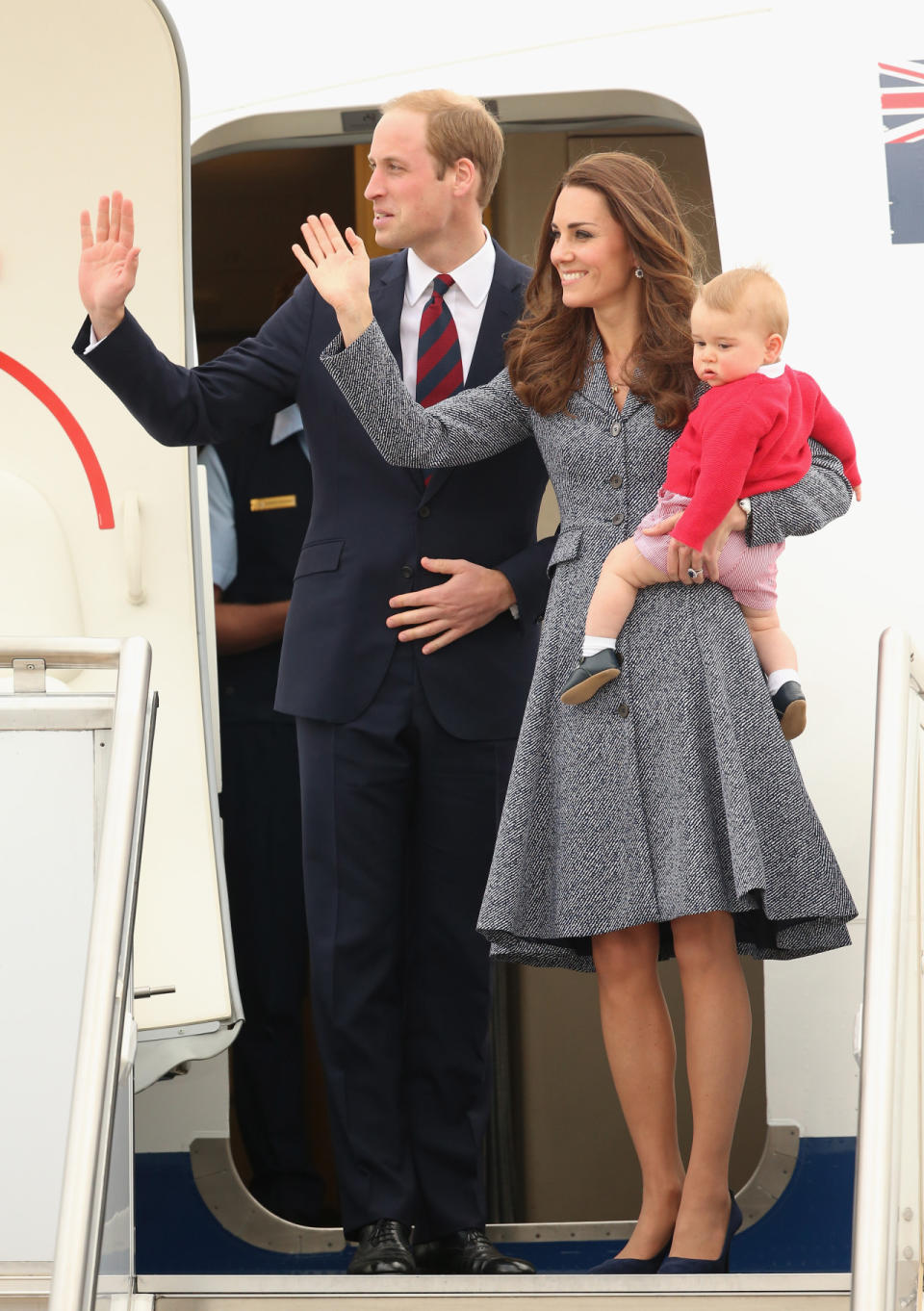 The Duchess wore a blue and white tweed Michael Kors Spring 2014 coat dress as she headed back to the UK after finishing a visit to Australia.