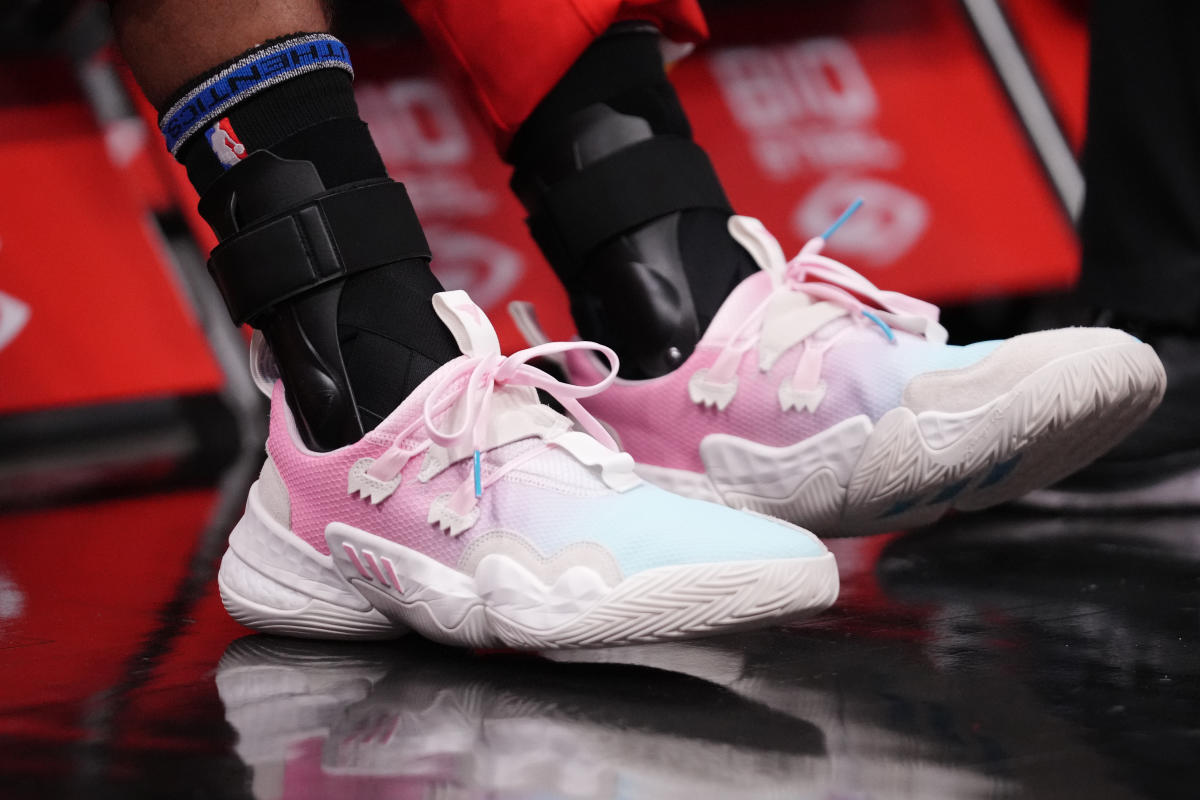 Trae Young debuts signature sneaker, apparel collection with Adidas ...