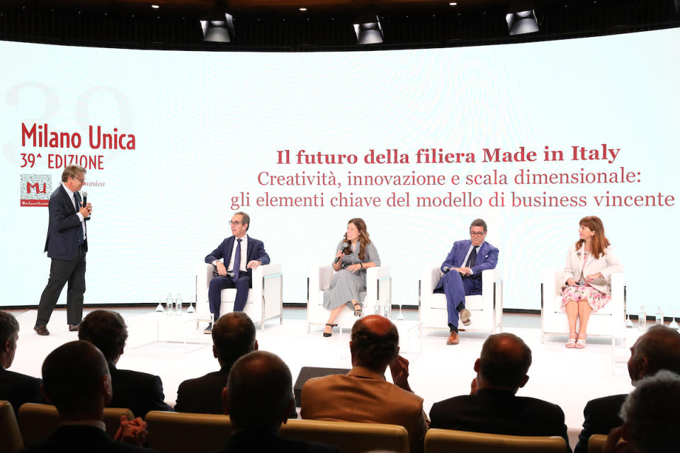 Panelists discussing the future of the made in Italy value chain during the opening ceremony.