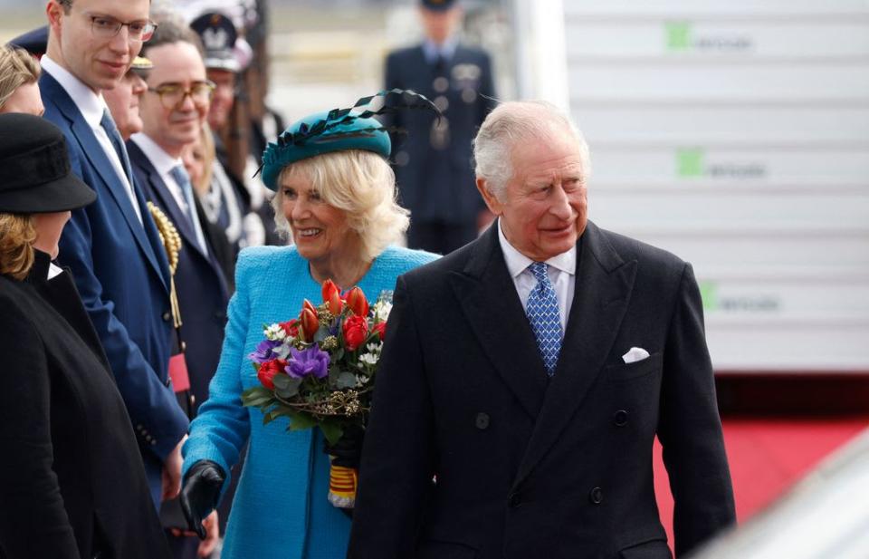 The King and Queen Consort were greeted by a delegation shortly after landing in Germany.