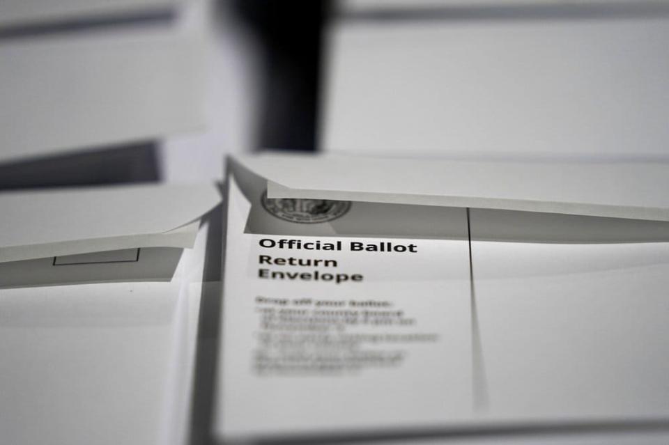 In this Sept. 3, 2020, file photo, stacks of ballot envelopes waiting to be mailed are seen at the Wake County Board of Elections in Raleigh, N.C. (AP Photo/Gerry Broome, File)