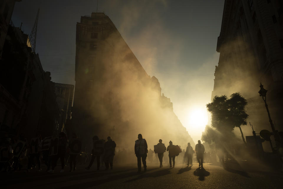 Protesters arrive at the Plaza de Mayo to demand higher salaries and more jobs, in Buenos Aires, Argentina, on May 12, 2022. (AP Photo/Victor R. Caivano)