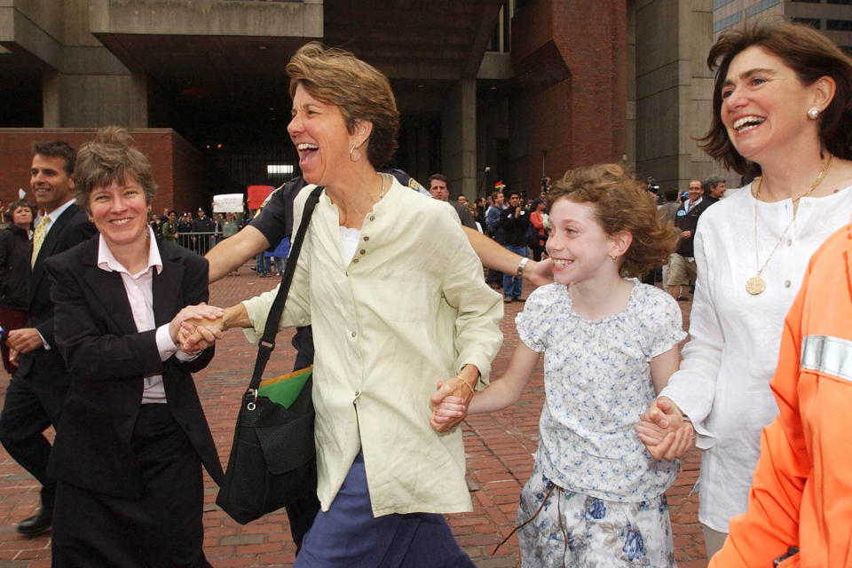 Hillary Goodridge (2nd-L), Julie Goodrid first same-sex couple marriage license in boston massachussetts (Stan Honda / AFP via Getty Images file)
