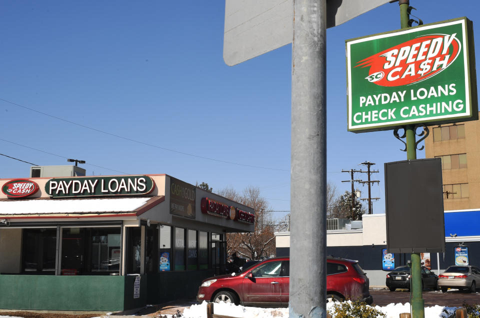 A women walks into the payday lender Speedy Cash on Feb. 21, 2018, in Lakewood, Colorado. (Photo: RJ Sangosti/Getty Images)