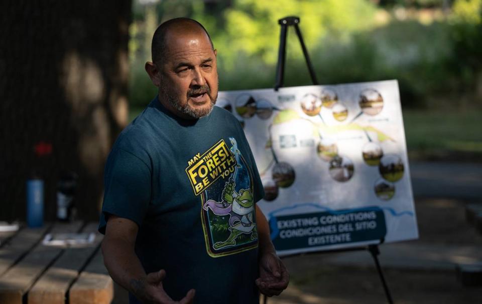 Art Fabela adds his ideas during the Tuolumne River Regional Park master plan update meeting in Mary Grogan Grove in Modesto, Calif., Thursday, June 7, 2023.