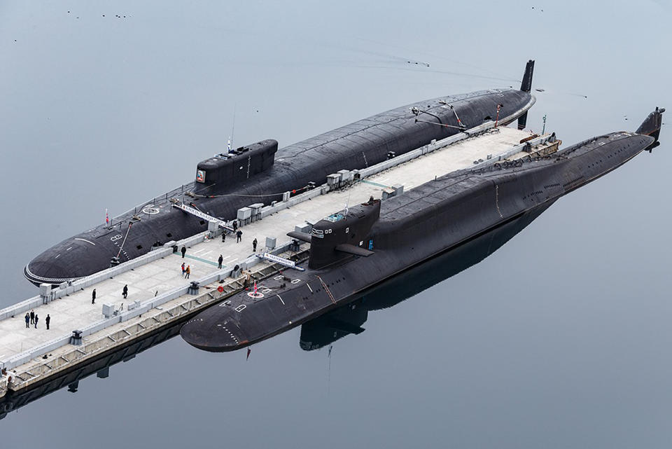 FILE - In this photo released by Russian Defense Ministry Press Service, Russian nuclear submarines Prince Vladimir, above, and Yekaterinburg are harbored at a Russian naval base in Gazhiyevo, Kola Peninsula, Russia, on April 13, 2021. Russian President Vladimir Putin has warned that he wouldn't hesitate to use nuclear weapons to ward off Ukraine's attempt to reclaim control of its occupied regions that Moscow is about to absorb. (Russian Defense Ministry Press Service via AP, File)