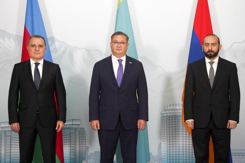 Azerbaijan's Foreign Minister Jeyhun Bayramov, left, Kazakhstan Foreign Minister Murat Nurtleu, center, and Armenian Foreign Minister Ararat Mirzoyan pose for a photo prior to their talks in Almaty, Kazakhstan, Friday, May 10, 2024. (Vladimir Tretyakov/NUR.KZ via AP)