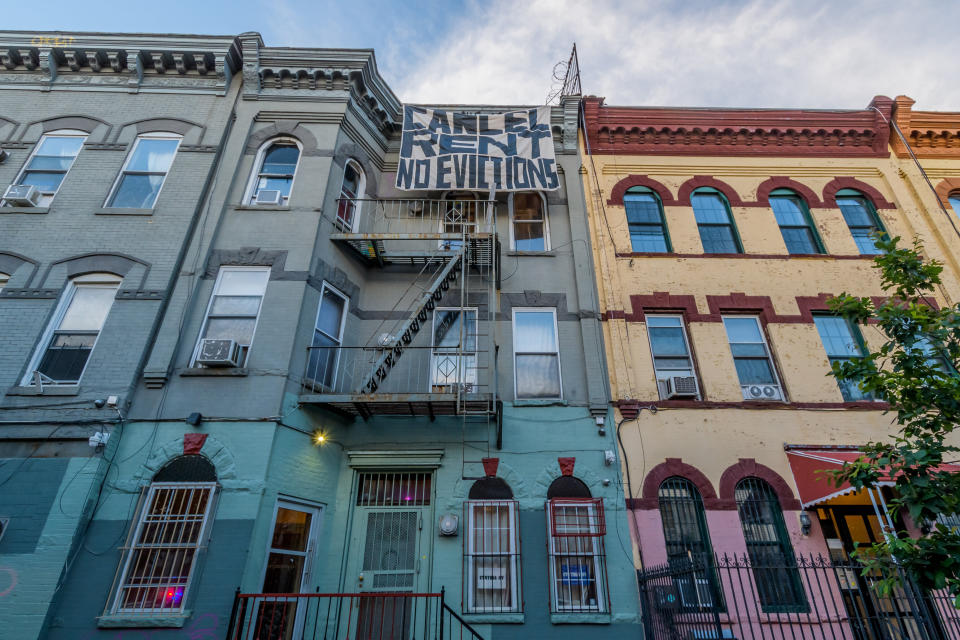 Tenants and housing activists dropped banners from their buildings and organized a march in the streets of Bushwick, Brooklyn, last year to demand the city cancel rent during the coronavirus pandemic. (Photo: Erik McGregor via Getty Images)