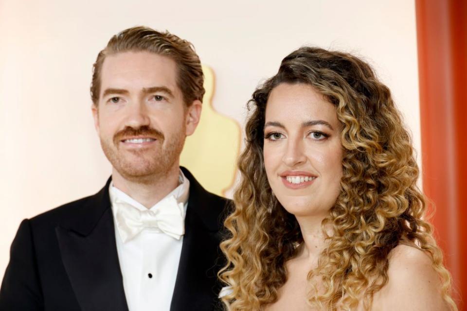 Andrew Eure and Florencia Martin attend the 95th Annual Academy Awards.