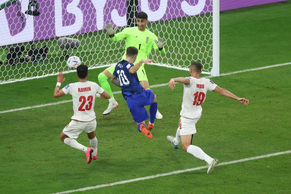 Christian Pulisic scores USMNT's first goal against Iran during their World Cup match at Al Thumama Stadium in Doha, Qatar on Nov. 29, 2022.