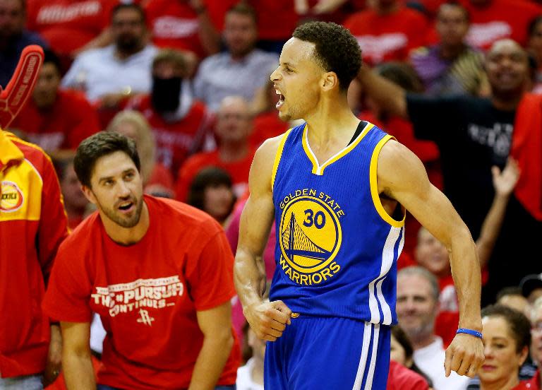 Stephen Curry of the Golden State Warriors reacts against the Houston Rockets during Game Three of the Western Conference Finals of the 2015 NBA PLayoffs at Toyota Center on May 23, 2015 in Houston, Texas