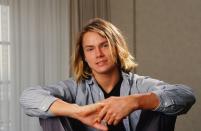 LOS ANGELES, CA - 1988: Actor River Phoenix (1970 - 1993), star of "Stand By Me," playfully poses during a 1988 Los Angeles, California, photo portrait session. Phoenix, a rising young film star, tragically died in 1993 outside a Sunset Strip nightclub of a drug overdose. (Photo by George Rose/Getty Images)