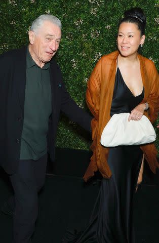 <p>Gregory Pace/Shutterstock</p> Robert De Niro (left) and Tiffany Chen on June 10