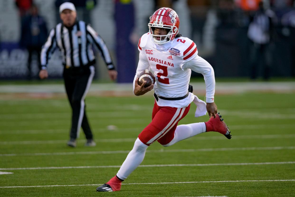Louisiana-Lafayette quarterback Zeon Chriss (2) eyes running room during last year's Independence Bowl. Houston beat the Ragin' Cajuns 23-16. This year's game pits Texas Tech against California on Dec. 16.