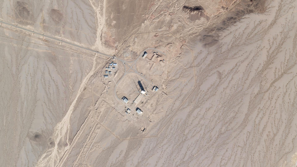 In this satellite photo by Planet Labs Inc., activity is seen at the Imam Khomeini Spaceport in Semnan province, Iran, Saturday, Dec. 11, 2021. Iran appears to be preparing for a space launch as negotiations continue in Vienna over its tattered nuclear deal with world powers, according to an expert and satellite images. (Planet Labs Inc. via AP)