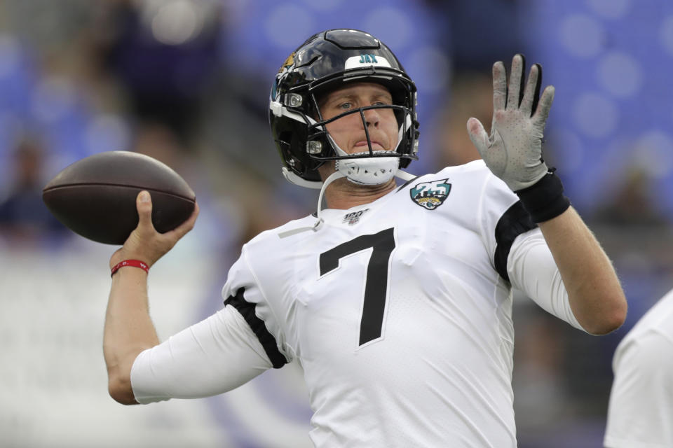 FILE - In this Thursday, Aug. 8, 2019 file photo, Jacksonville Jaguars quarterback Nick Foles works out prior to an NFL football preseason game against the Baltimore Ravens in Baltimore. The Jaguars believe signing the quarterback who was MVP of the 2018 Super Bowl is the key to fixing a team that finished last in the AFC South for the second time in three years, the last just months after playing in the AFC championship. (AP Photo/Julio Cortez, File)