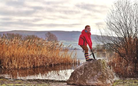 The sword was fixed into the stone with cement next to the lake which has been rumoured to be one of the possible locations of legendary Camelot - Credit:  WALES NEWS SERVICE