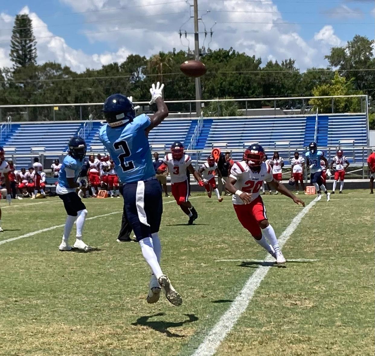 Miami Palmetto wide receiver Jacory Barney goes up for a catch in a spring jamboree at Palm Beach Gardens on May 20.