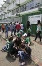 <p>Fans of Brazil’s soccer team Chapecoense gather at the Arena Conda stadium in Chapeco, Brazil, Tuesday, Nov. 29, 2016. A chartered plane that was carrying the Brazilian soccer team to the biggest match of its history crashed into a Colombian hillside and broke into pieces, killing 75 people and leaving six survivors, Colombian officials said Tuesday. (AP Photo/Andre Penner) </p>