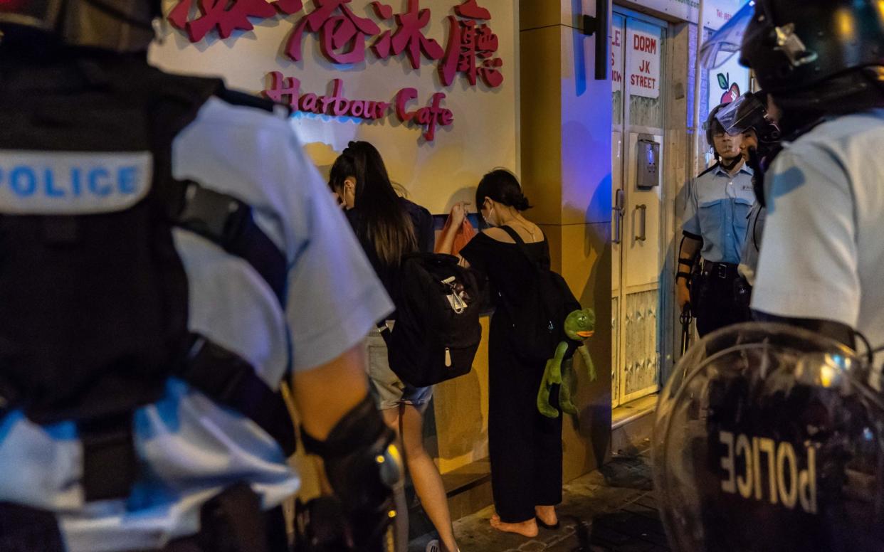 Riot police arrest protesters after clashes in Sham Shui Po (file photo) - Getty Images AsiaPac