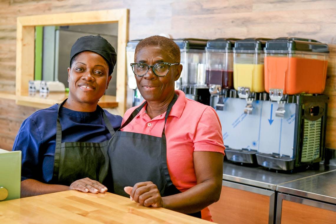 Owner Shanoy Miller, left and her mother Cleopatra James at Roots Plant Based Cafe at 100 Hamilton Pointe Drive, Suite 155, in Byron.