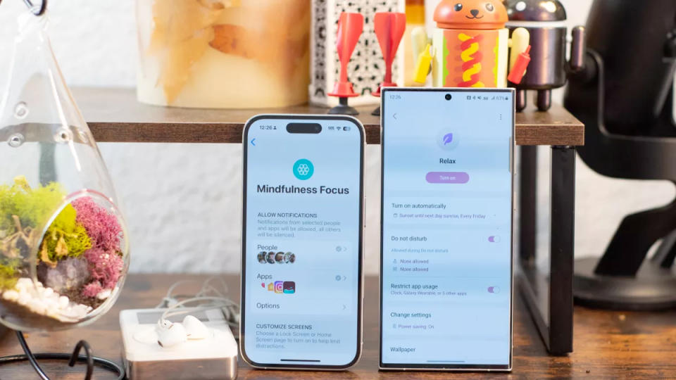 iPhone 14 Pro and Galaxy S23 Ultra showing Focus modes on screen