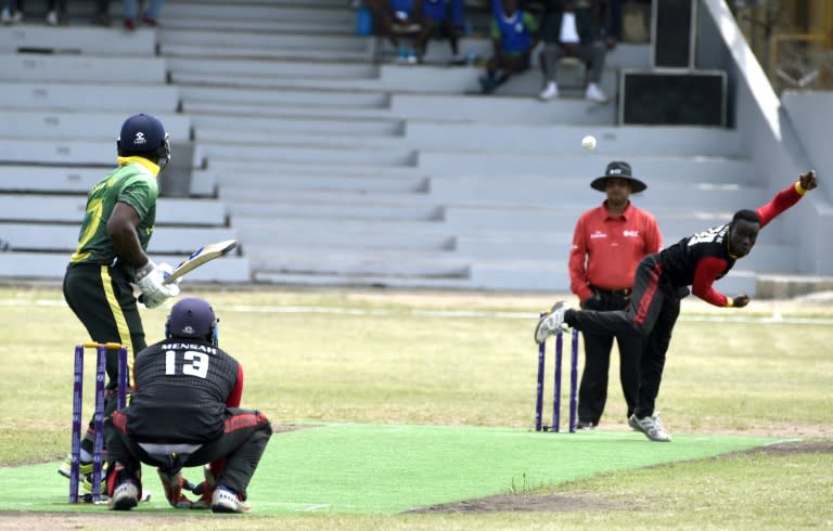 Different strokes: Nigerian batsman Dotun Olatunji faces a delivery from Ghanaian bowler Michael Aboagye during the International Cricket Council (ICC) World Twenty20 qualification match in Lagos