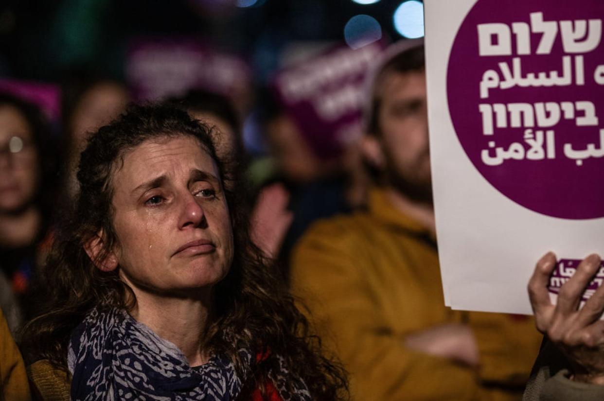 A demonstration on Dec. 28, 2023, in Tel Aviv, organized by the peace group Standing Together, calls for a cease-fire. <a href="https://www.gettyimages.com/detail/news-photo/people-gather-to-stage-demonstration-calling-for-peace-and-news-photo/1883324720?adppopup=true" rel="nofollow noopener" target="_blank" data-ylk="slk:Anadolu via Getty Images;elm:context_link;itc:0;sec:content-canvas" class="link ">Anadolu via Getty Images</a>