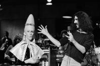 <p>Two years after his appearance as a musical guest in 1976, Frank Zappa was asked to host <em>SNL</em>. In the book <em>Live From New York</em>, authors James Andrew Miller and Tom Shales quote Don Novello, a writer for the show at the time, as saying "the Frank Zappa show was like one of the worst ever." Zappa was never invited back.</p>