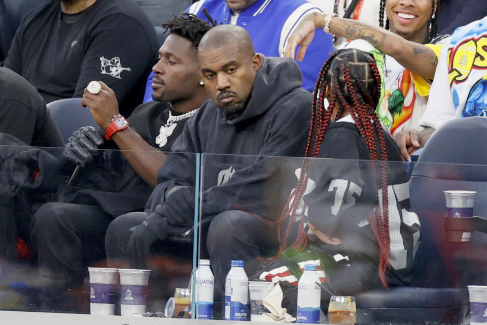 Antonio Brown, Kanye West, and North West at the Super Bowl