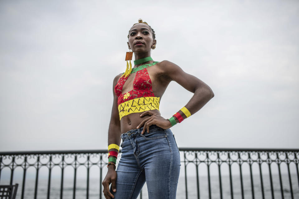A model presents clothes made by Maguy Mbaka Guy from Kinshasa during the ninth edition of the Liputa fashion show in Goma, Democratic Republic of Congo, Saturday June 24, 2023. The objective of the show, involving designers, models and artists from DRC, Cameroon, Central African Republic, Senegal, Burundi, France, United States and others, is to reveal the latest trends, but also to deliver a message of peace and peaceful coexistence during a period of high tension between the DRC and Rwanda, accused by Kinshasa of supporting the M23 rebellion in the east of country. (AP Photo/Moses Sawasawa)
