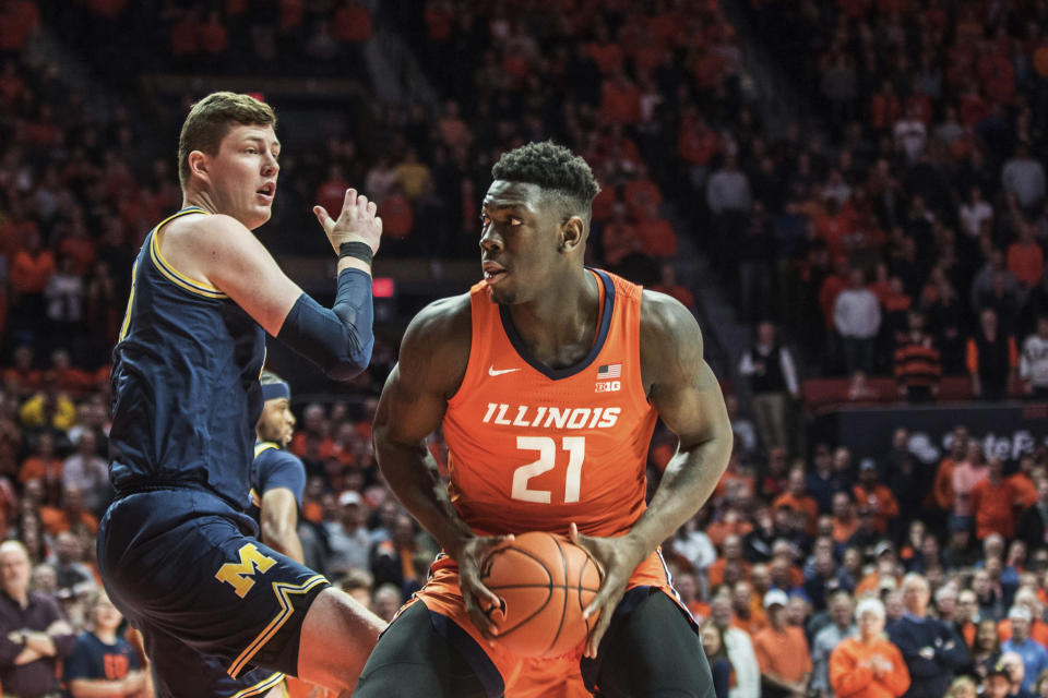 After drawing an and-one foul under the hoop, Illinois center Kofi Cockburn accidentally punched official Lewis Garrison square in the head on Wednesday.