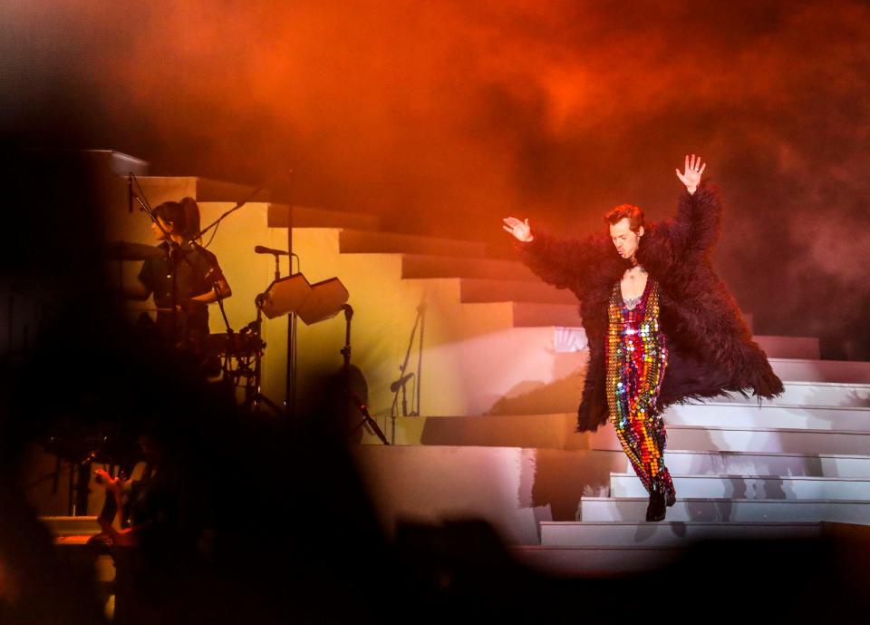 Headliner Harry Styles makes his grand entrance to begin his set at the Coachella stage.