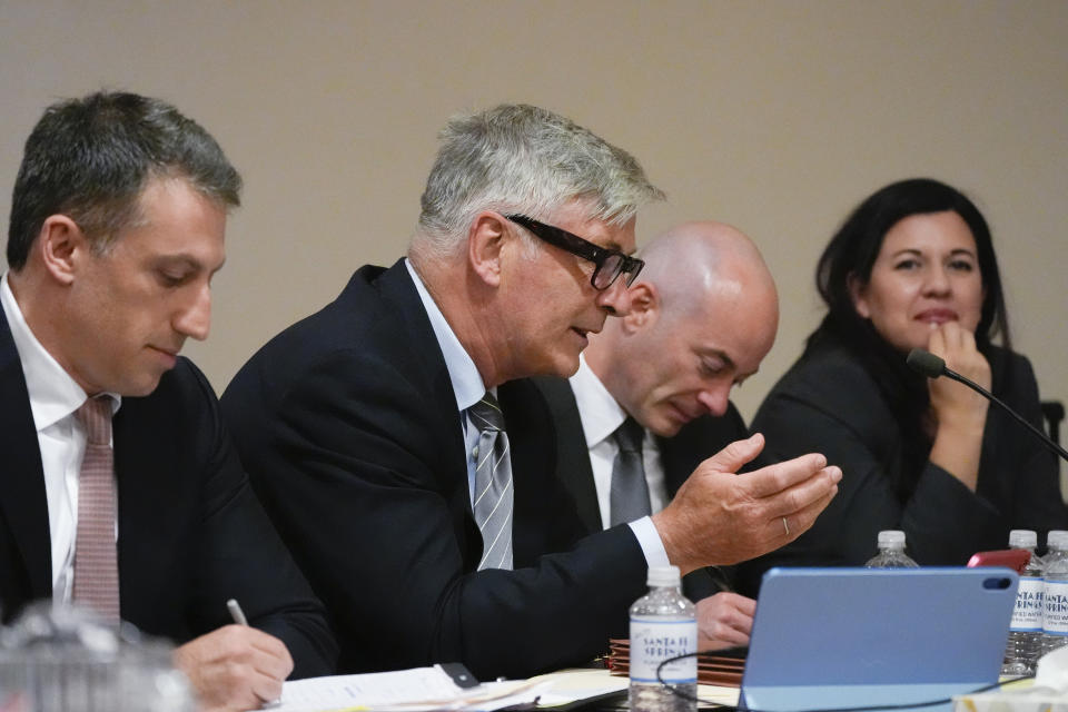 Lawyers Alex Spiro, from left, actor Alec Baldwin, Luke Nikas and Heather LeBlanc participate in a pretrial hearing in Santa Fe, N.M., on Monday, July 8, 2024. Baldwin is facing a single charge of involuntary manslaughter in the death of a cinematographer. (AP Photo/Ross D. Franklin, Pool)