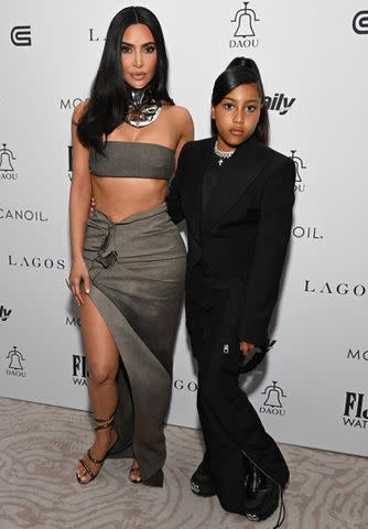 <p>Michael Kovac/Getty Images</p> Kim Kardashian (left) and North West