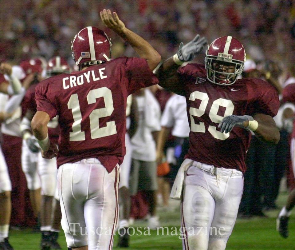 9-21-02---Tuscaloosa, Al--Alabama quarterback Brodie Croyle high fives tailback Ahmaad Galloway after Croyle scored a touchdown against Southern Mississippi. Croyle and Galloway both scored touchdowns in the first half to make the score 14-0 at the half.(Tuscaloosa News/Robert Sutton)

Tuscaloosa News