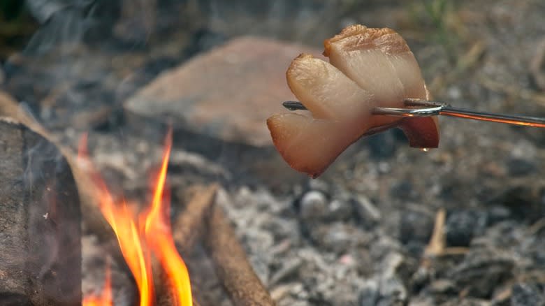 szalonna cooking on open fire