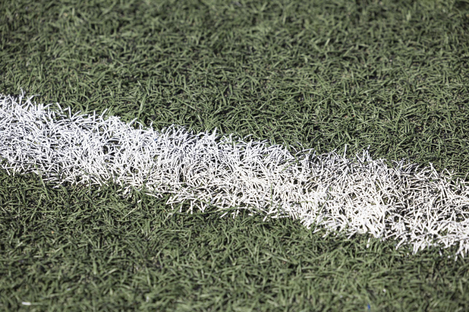 The artificial turf is shown during Tulsa's NCAA college football game against Oklahoma in Tulsa, Okla., Sept. 18, 2023. Artificial turf has come a long way since since it was introduced on a grand stage to the sports world in 1966 at the Astrodome in Houston. These days, the soft plastic grass surfaces often look and feel like the real thing. (AP Photo/Alonzo Adams)