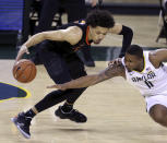 Baylor guard Mark Vital (11) tries to steal the ball from Oklahoma State guard Cade Cunningham (2) in the second half of an NCAA college basketball game, Thursday, March 4, 2021, in Waco, Texas. (AP Photo/Jerry Larson)