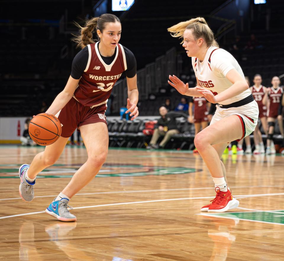 Worcester Academy's Ella Getz of Wayland drives to the basket against the Rivers School at the TD Garden in Boston on Sunday.