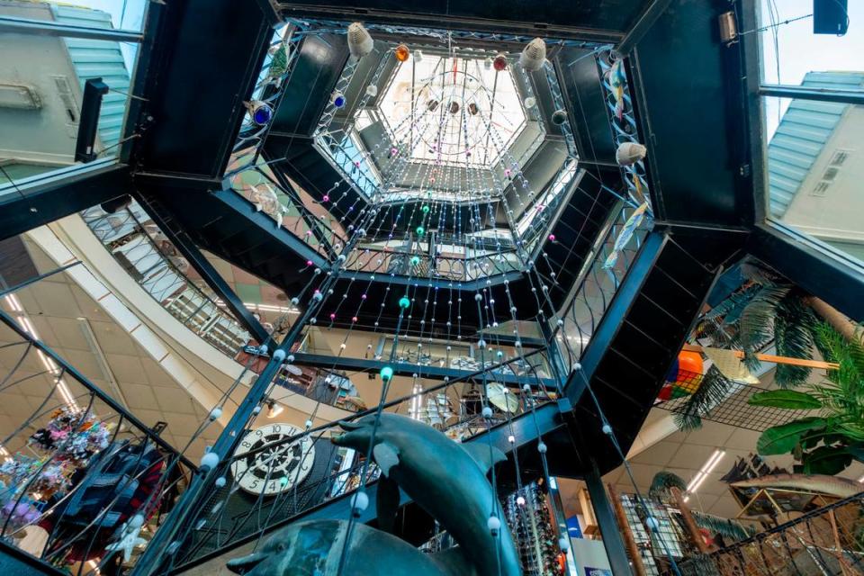 A spiral staircase with a dolphin fountain in the center connects levels of The Gay Dolphin. The landmark gift shop along Myrtle Beach’s Ocean Boulevard and the Myrtle Beach Boardwalk was incorporated by Justin Plyler in 1946. The business is still operated by the Plyler family and is one of the most visited tourist destinations in Myrtle Beach, S.C. November, 14, 2023.