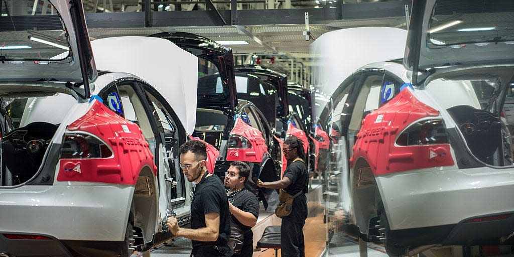 Workers at a car factory.