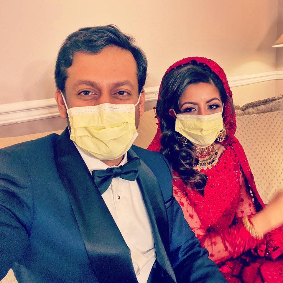 Kashif Chaudhry and Naila Shereen celebrate their marriage at her parents' home in New Windsor, NY. Amid a coronavirus outbreak, the doctors canceled a large wedding and honeymoon and went back to work.