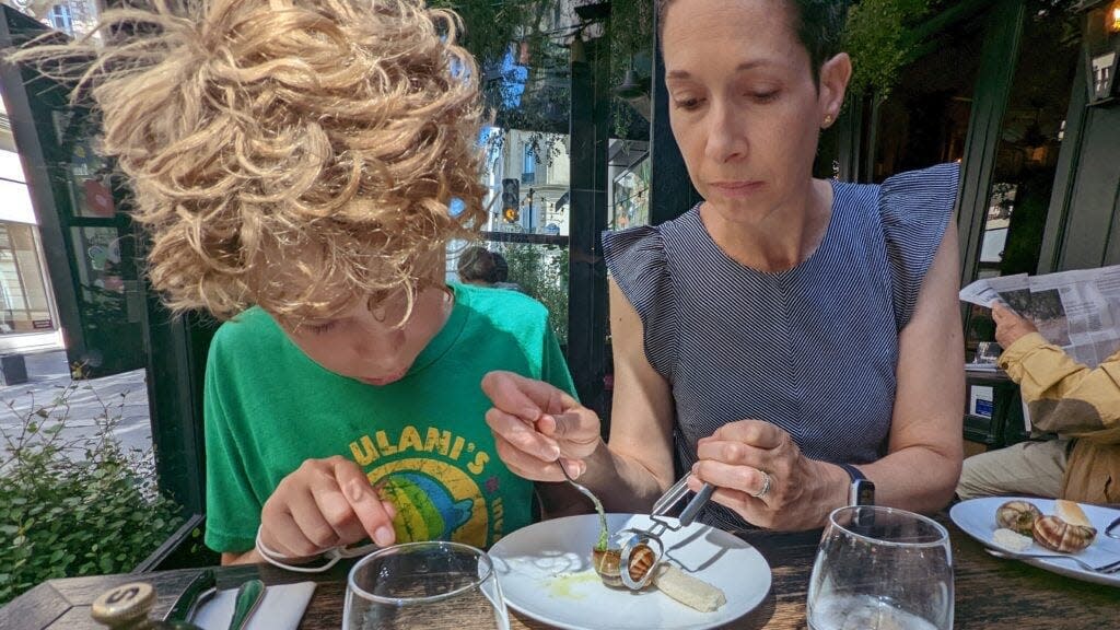 Memorable travel experiences like this one (my kids wanted to try escargot) were amazing, but at the end of every day I was beyond exhausted.
