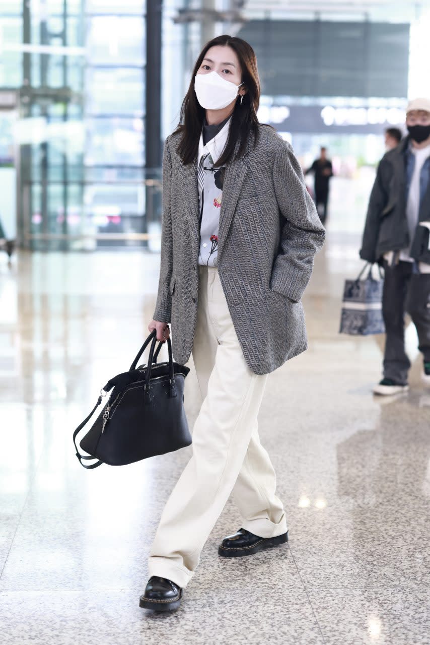 SHANGHAI, CHINA - MARCH 22: Model Liu Wen is seen at an airport on March 22, 2023 in Shanghai, China.