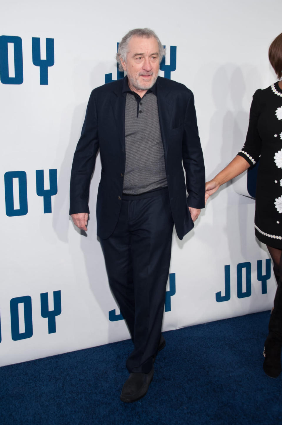 Robert De Niro in a blue suit at the “Joy” premiere in New York City.