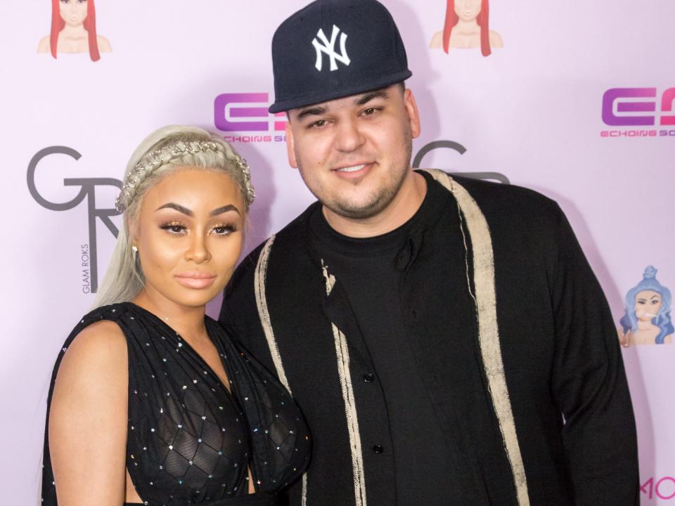 Rob Kardashian and Blac Chyna on a red carpet.